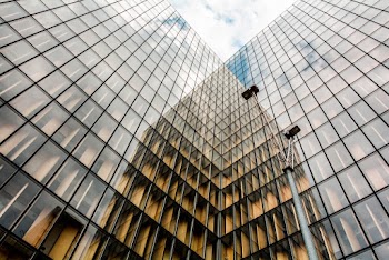 Low Angle Photography of Glass Building