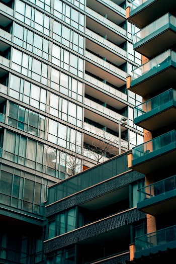 Low Angle Photography of Glass Window Building