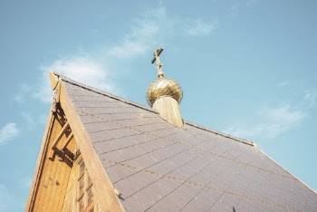 Low-angle Photography of Gray Cathedral