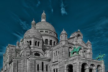 Low-angle Photography of Gray Concrete Cathedral