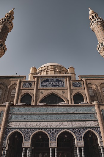 Low-angle Photography of Gray Concrete Mosque