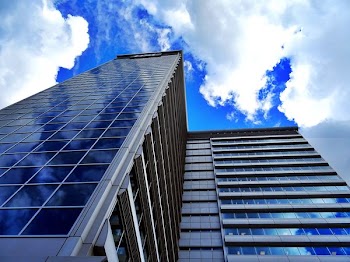Low-angle Photography of Gray Mirror Wall Building