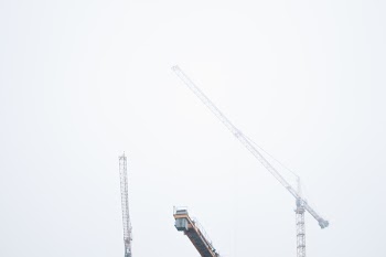 Low-angle Photography of Gray Tower Crane