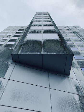 Low Angle Photography of Green High-rise Building
