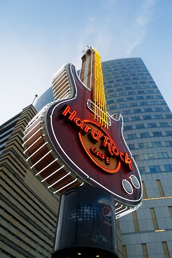 Low Angle Photography of Hard Rock Cafe Guitar Signage