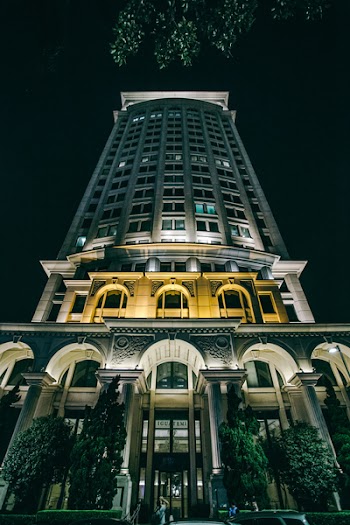 Low Angle Photography of High-rise Building at Night