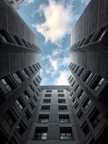 Low Angle Photography of High Rise Building Under Blue Sky