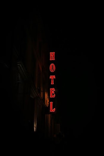 low-angle photography of Hotel signage