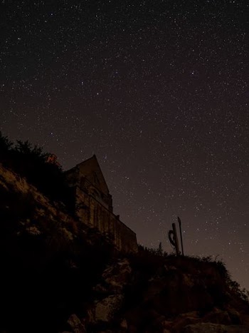 low-angle photography of house under stars