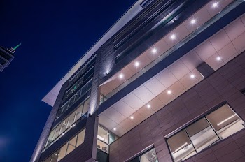 Low Angle Photography Of Lighted High-rise Building 