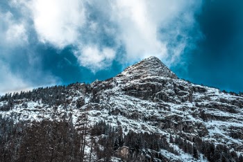 Low Angle Photography of Mountain Covered Snow