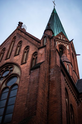 Low Angle Photography of Red and Green Cathedral