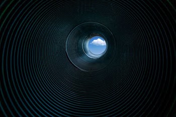 low angle photography of tube interior