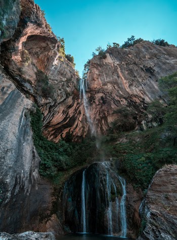 Low Angle Photography Of Waterfalls 