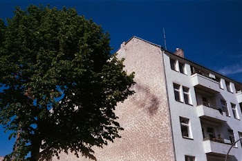 Low Angle Photography of White and Brown Concrete Building