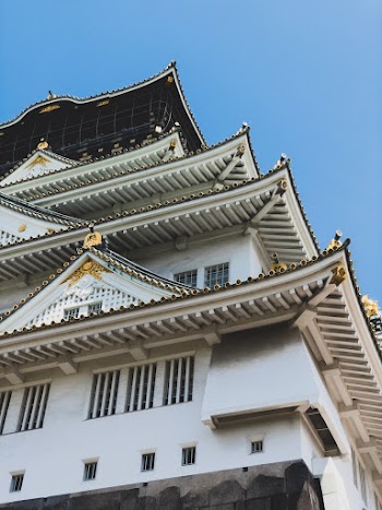 Low-angle Photography of White and Gold Pagoda Temple