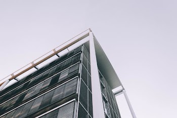 low-angle photography of white building