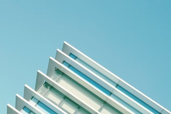 low angle photography of white building