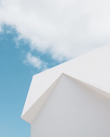 low-angle photography of white building