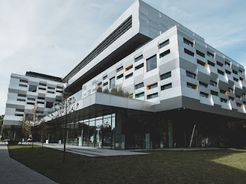 Low-angle Photography of White Concrete Building