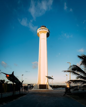 Low-angle Photography of White Concrete Tower Under Clear Blue Sky