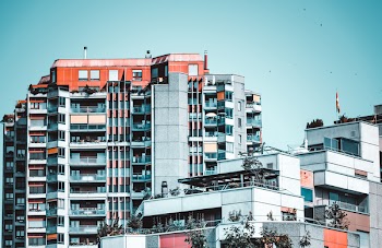 Low Angle Photography of White High-rise Building