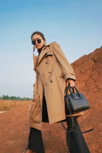 Low Angle Photography of Woman Wearing Brown Coat