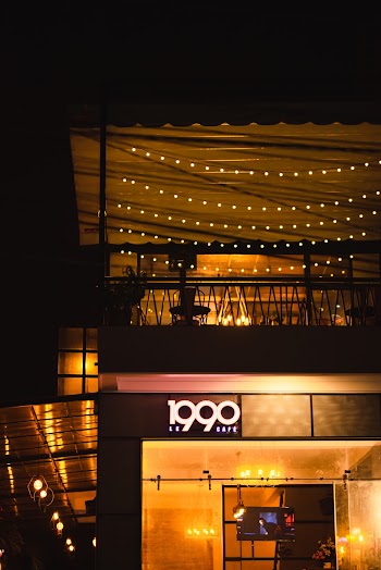 Low Angle Shot Of  Building Facade With Illuminated Lights
