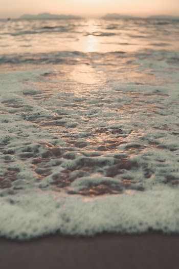 Low Angle Shot Of  Waves On The Shore