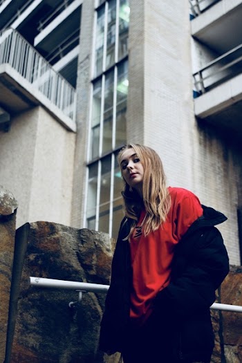 Low Angle Shot of Young Woman