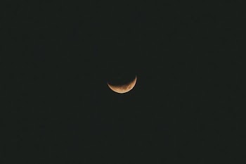 low angle view of crescent moon