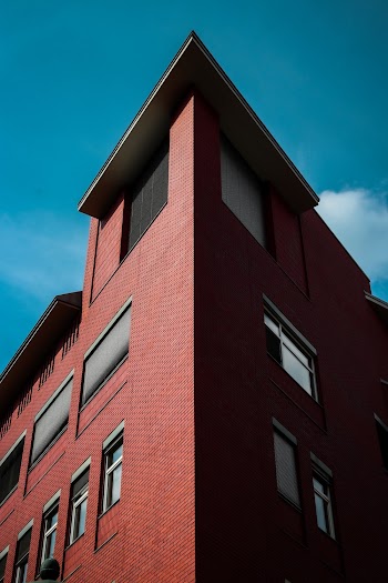 Low-Angle View of Red Painted Building