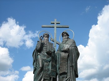 Low-angle View of Two Standing Men Statue