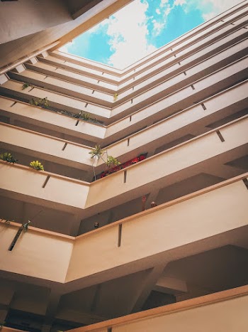 Low-angle View of White Concrete Building