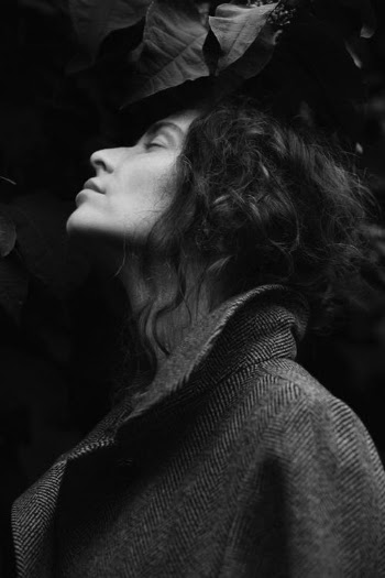 Low Angle View of Woman with Eyes Closed · Free Stock Photo
