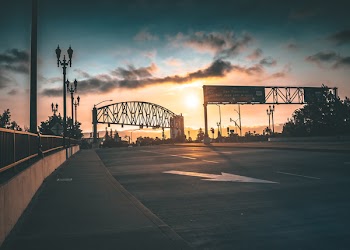 Low Light Photography of Gray Steel Arch