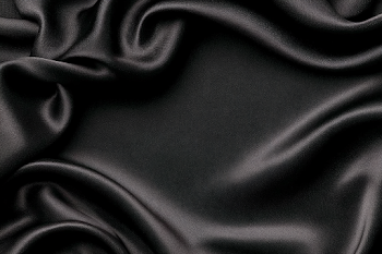 Luxurious Black Satin Silk Fabric Background