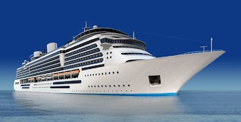 luxury white cruise ship shot at angle at water level on a clear day with calm seas and blue sky