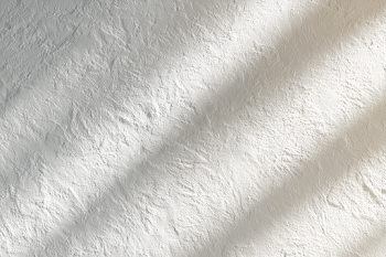 Luxury White Plaster Wall with Subtle Limewash Texture