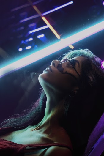 Lying Woman Inside Dark Room