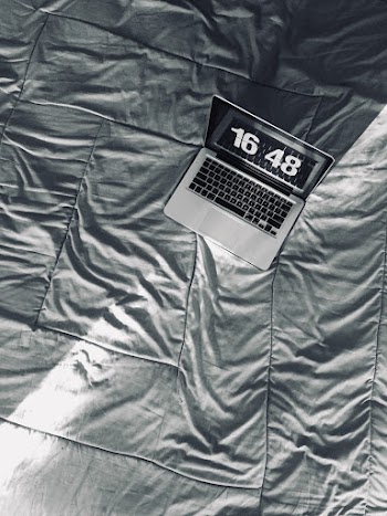 Macbook on Gray Textile