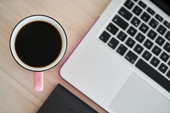 Macbook Pro Beside Pink Mug 