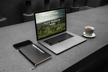 MacBook Pro Workspace PSD Mockup your website here 