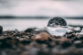 Macro Photography of Water on Sand