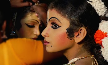 Macro Photography of Woman Wearing White Headpiece and Face Makeup