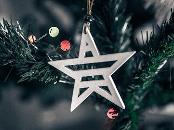 Macro Shift Photography of White Wooden Star Christmas Decor