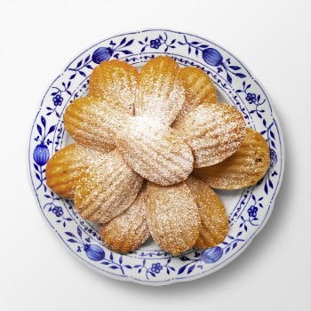 Madeleine biscuits on a plate, | Free PSD - rawpixel