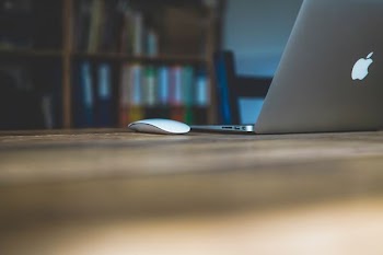 Magic mouse on brown table
