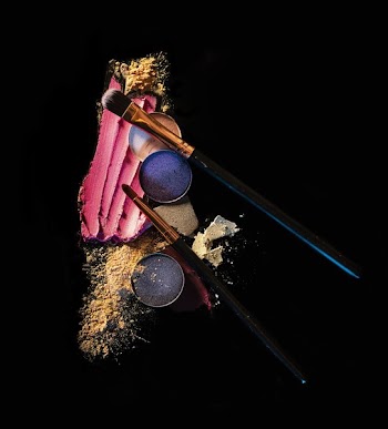 Makeup And Brushes On Black Background
