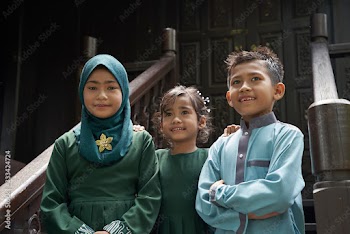 malay children waiting for guest during ramadan celebration
